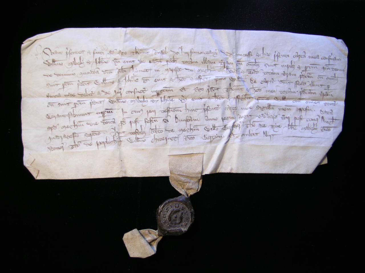Fourteenth-century parchment still carrying its wax seal