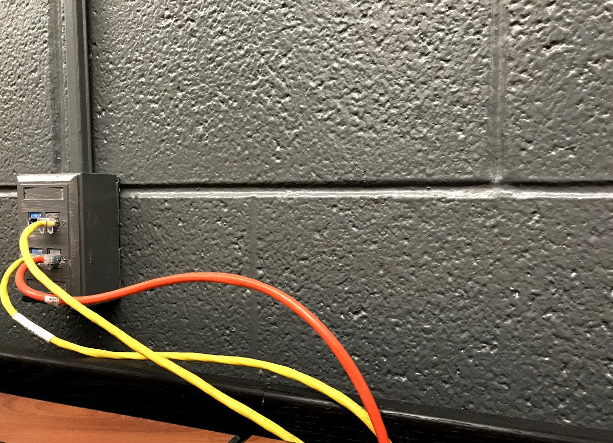 Network cables in a rack showing AffixIO as a layer among existing systems